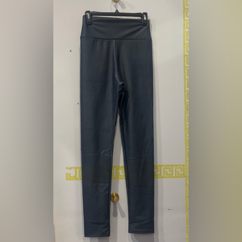 Navy Blue tight fitting faux leather pants.